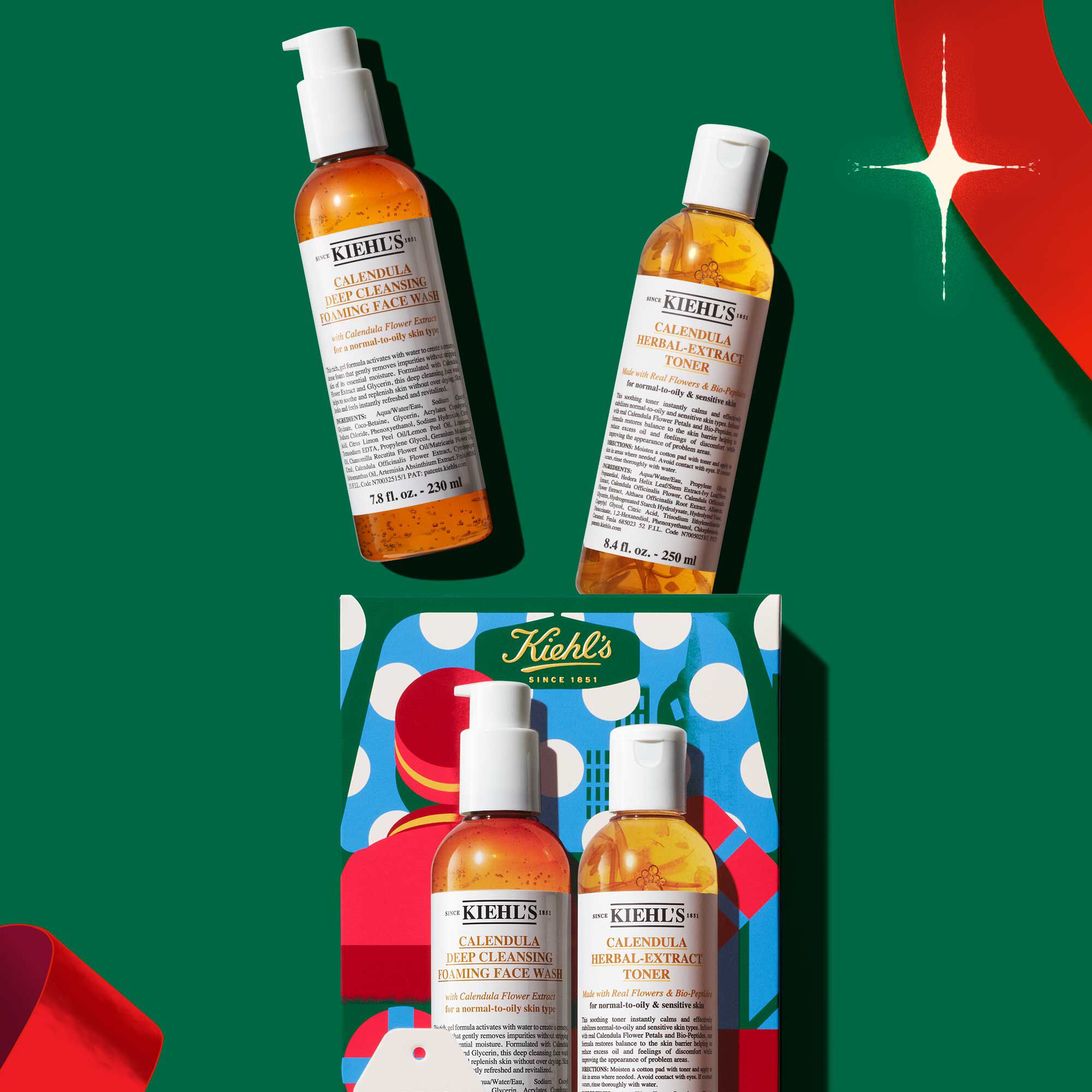 "Hydrating Holiday Hits" skincare gift set on a green background, featuring Ultra Facial Cream and Creamy Eye Treatment with Avocado in festive packaging.