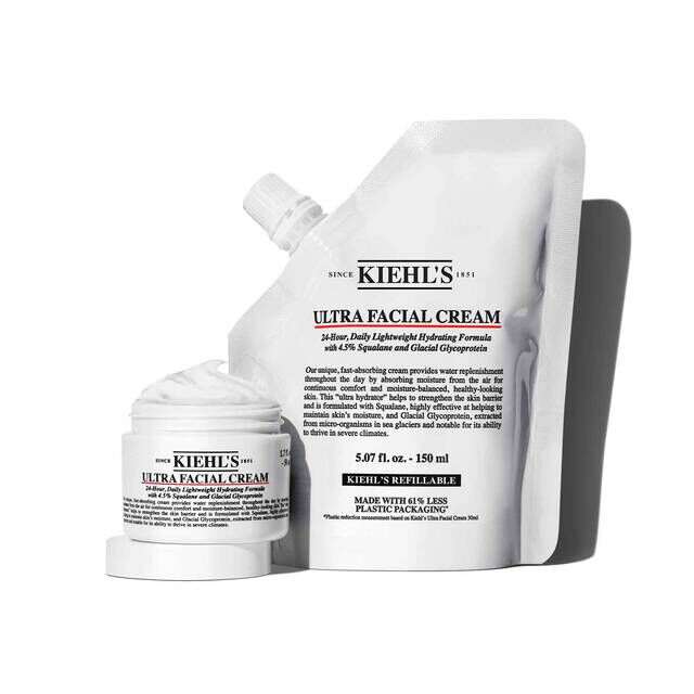 Kiehl's Ultra Facial Cream in a jar and a larger refill pouch, promoting sustainable skincare practices.