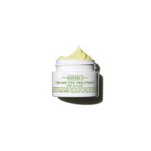 Open jar of Kiehl's Creamy Eye Treatment with Avocado, showing the pale green eye cream inside